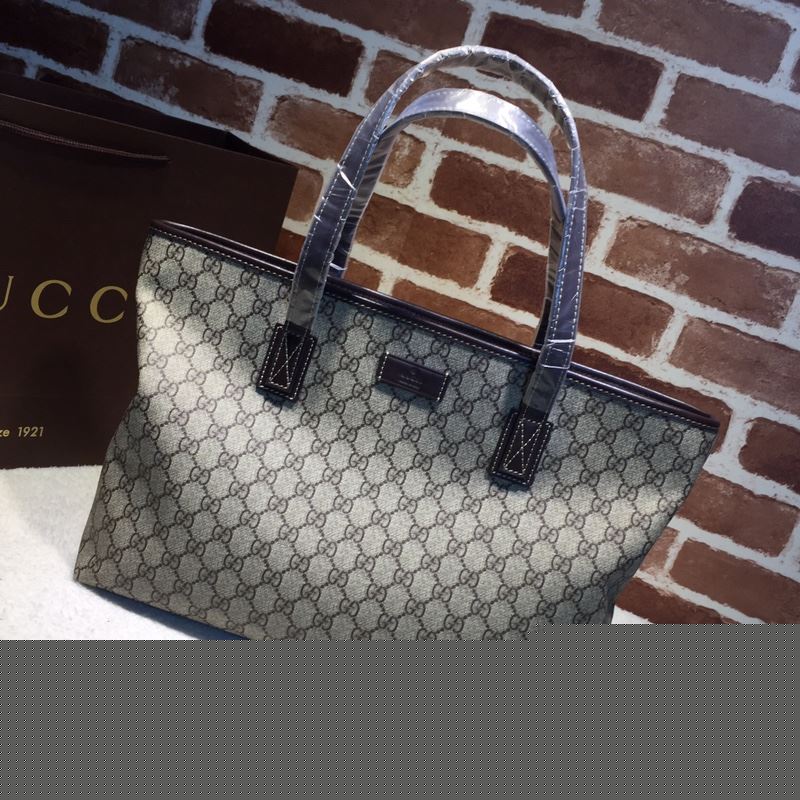 G*u*i shopping bags